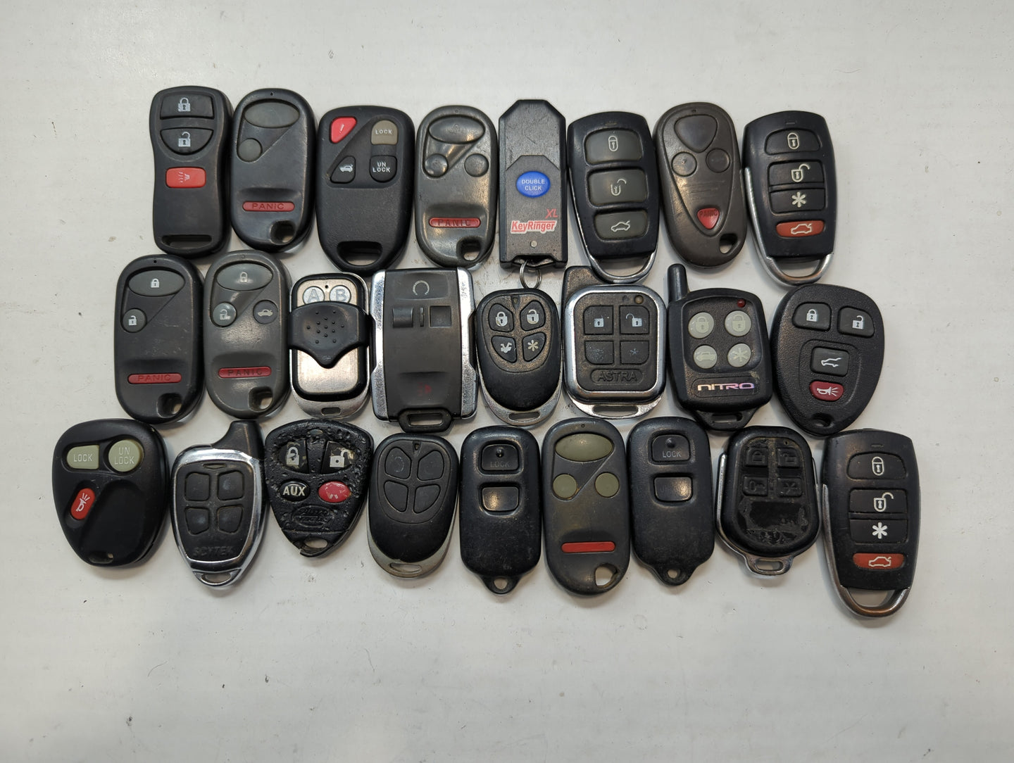 Lot of 25 Aftermarket Keyless Entry Remote Fob MIXED FCC IDS MIXED PART - Oemusedautoparts1.com