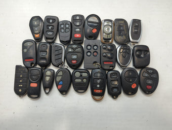 compare product Lot of 25 Aftermarket Keyless Entry Remote Fob MIXED FCC IDS MIXED PART
