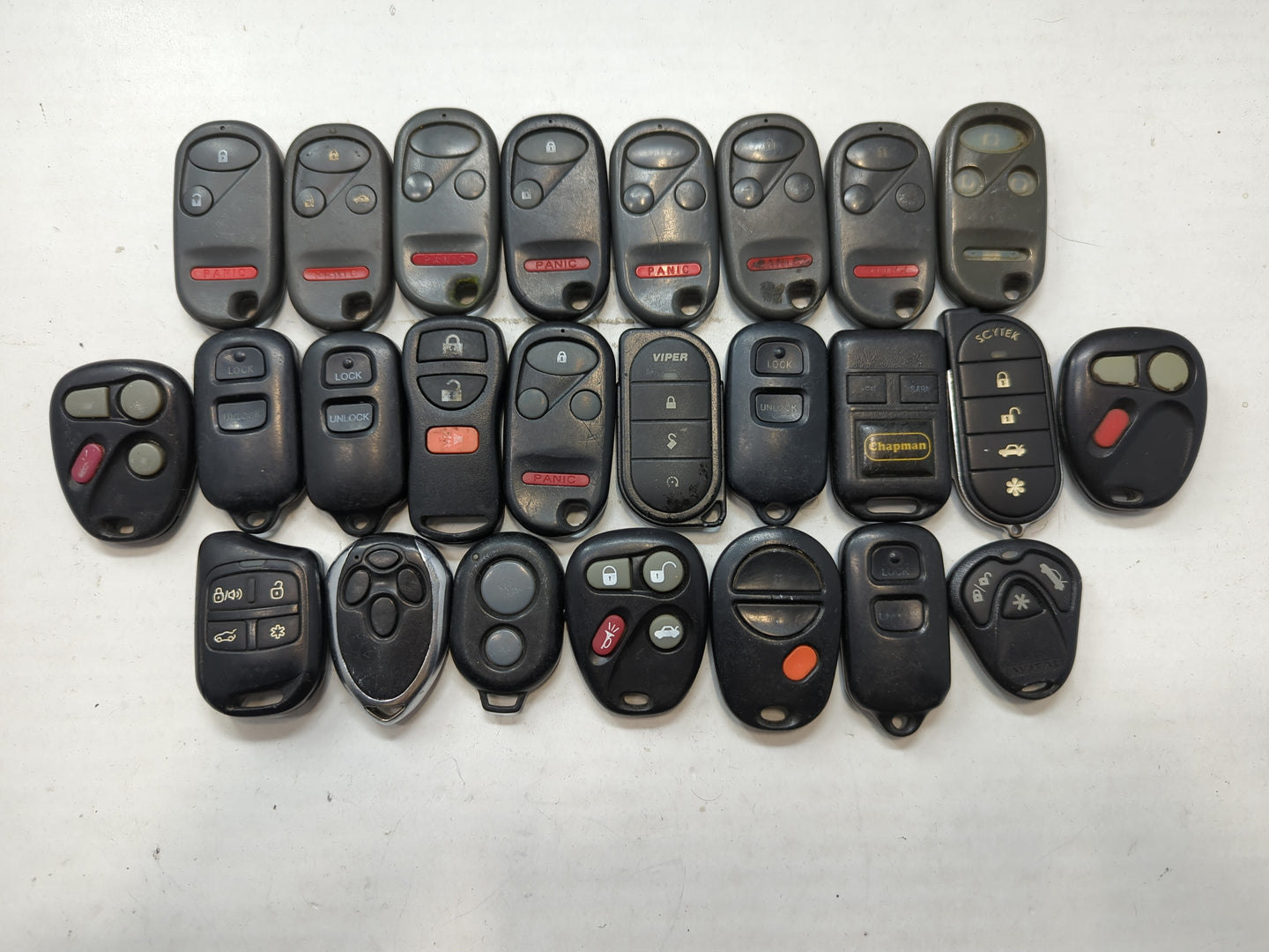 Lot of 25 Aftermarket Keyless Entry Remote Fob MIXED FCC IDS MIXED PART - Oemusedautoparts1.com