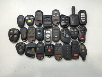 compare product Lot of 25 Aftermarket Keyless Entry Remote Fob MIXED FCC IDS MIXED PART