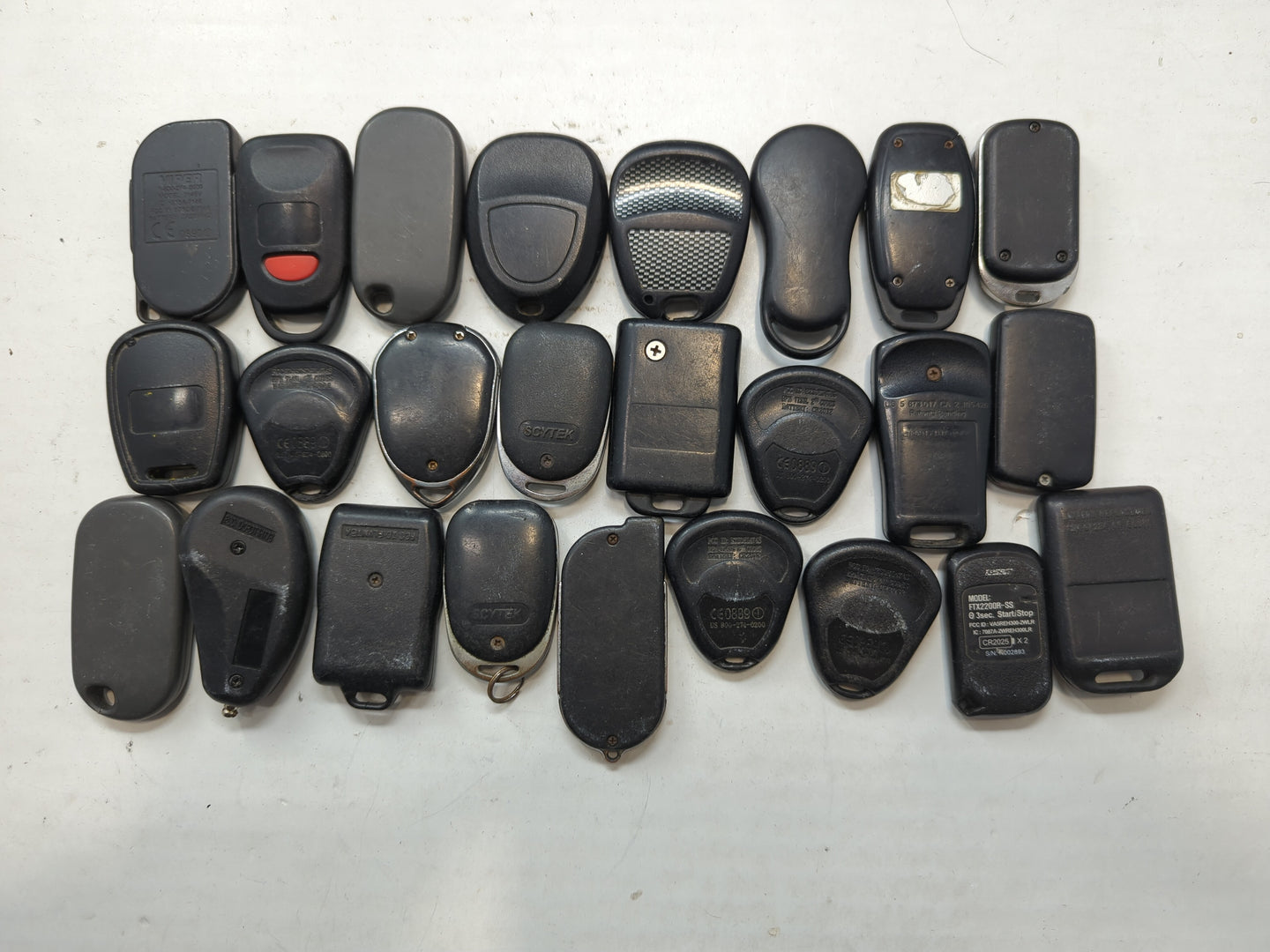 Lot of 25 Aftermarket Keyless Entry Remote Fob MIXED FCC IDS - Oemusedautoparts1.com