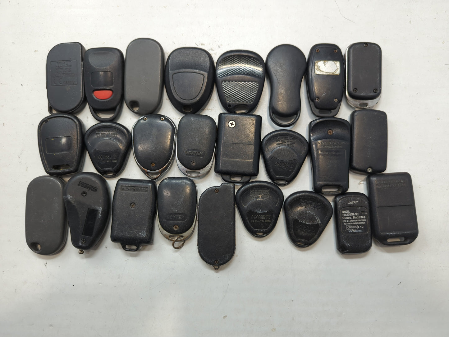 Lot of 25 Aftermarket Keyless Entry Remote Fob MIXED FCC IDS - Oemusedautoparts1.com
