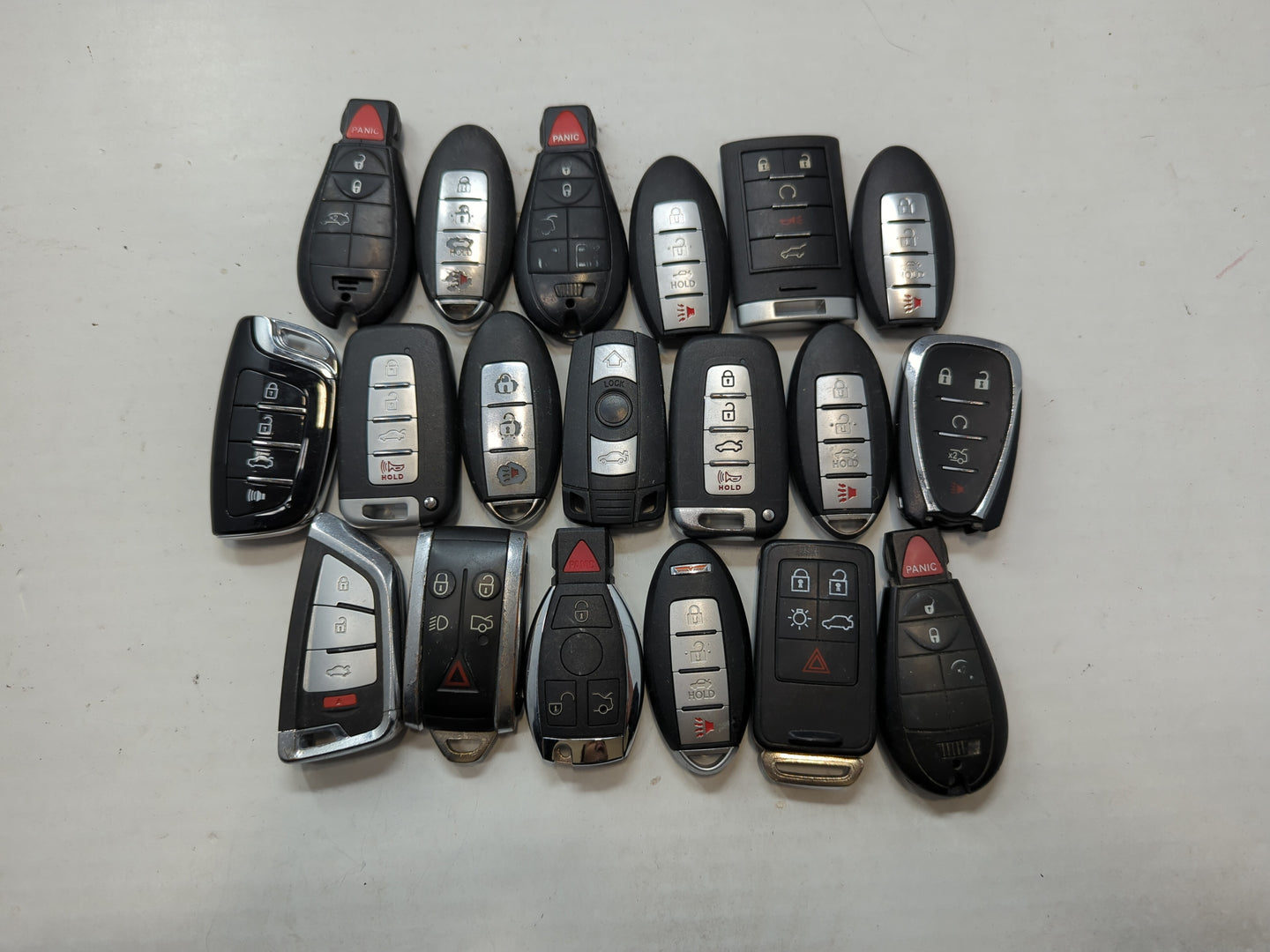 Lot of 19 Aftermarket Keyless Entry Remote Fob MIXED FCC IDS MIXED PART - Oemusedautoparts1.com