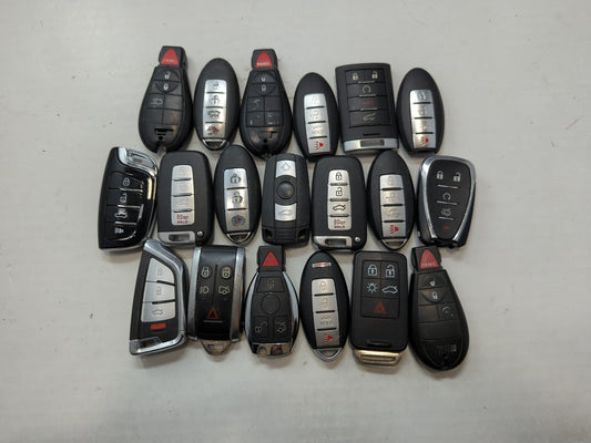 Lot of 19 Aftermarket Keyless Entry Remote Fob MIXED FCC IDS MIXED PART - Oemusedautoparts1.com