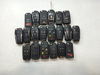 compare product Lot of 24 Aftermarket Keyless Entry Remote Fob MIXED FCC IDS MIXED PART