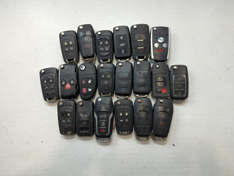compare product Lot of 24 Aftermarket Keyless Entry Remote Fob MIXED FCC IDS MIXED PART