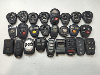 compare product Lot of 25 Aftermarket Keyless Entry Remote Fob MIXED FCC IDS MIXED PART