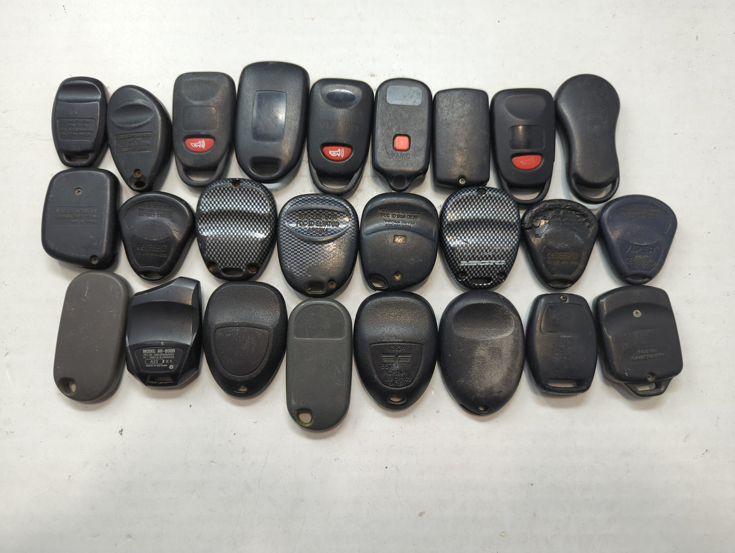 Lot of 25 Aftermarket Keyless Entry Remote Fob MIXED FCC IDS MIXED PART - Oemusedautoparts1.com
