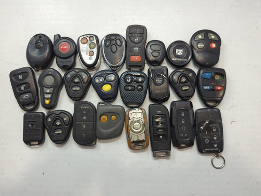 Lot of 24 Aftermarket Keyless Entry Remote Fob MIXED FCC IDS MIXED PART - Oemusedautoparts1.com