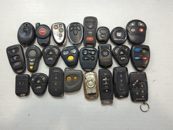compare product Lot of 24 Aftermarket Keyless Entry Remote Fob MIXED FCC IDS MIXED PART