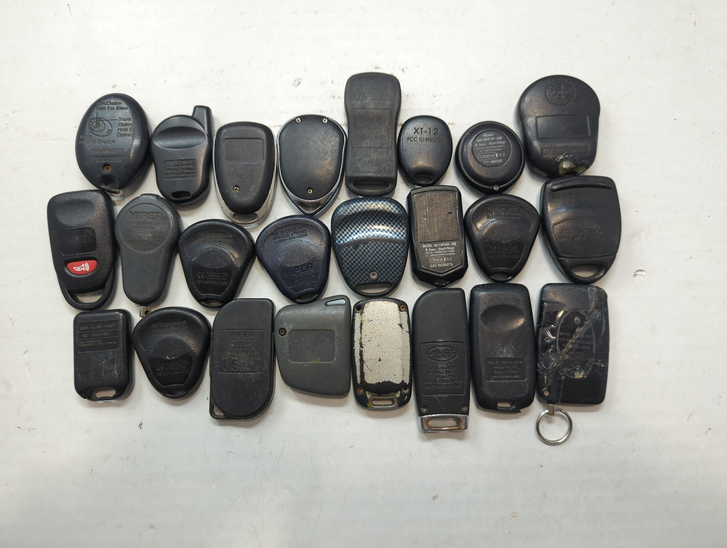 Lot of 24 Aftermarket Keyless Entry Remote Fob MIXED FCC IDS MIXED PART - Oemusedautoparts1.com