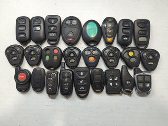 compare product Lot of 25 Aftermarket Keyless Entry Remote Fob MIXED FCC IDS MIXED PART