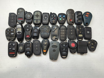 compare product Lot of 30 Aftermarket Keyless Entry Remote Fob MIXED FCC IDS MIXED PART