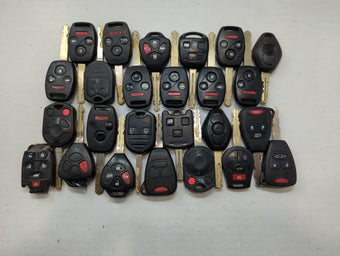 compare product Lot of 25 Aftermarket Keyless Entry Remote Fob MIXED FCC IDS MIXED PART