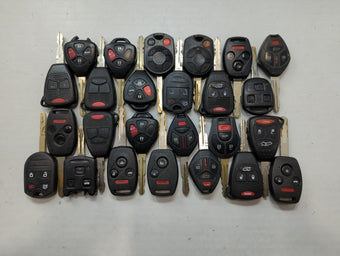 compare product Lot of 25 Aftermarket Keyless Entry Remote Fob MIXED FCC IDS MIXED PART