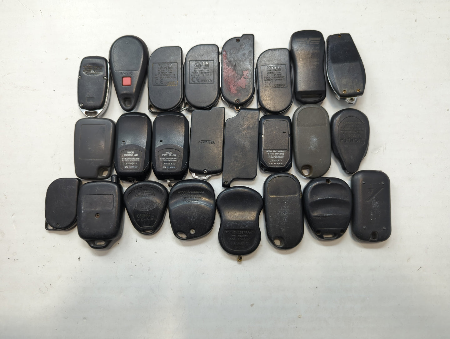 Lot of 25 Aftermarket Keyless Entry Remote Fob MIXED FCC IDS MIXED PART - Oemusedautoparts1.com