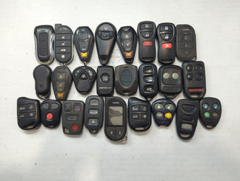 compare product Lot of 25 Aftermarket Keyless Entry Remote Fob MIXED FCC IDS MIXED PART