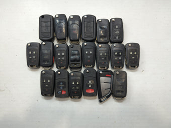 compare product Lot of 24 Aftermarket Keyless Entry Remote Fob MIXED FCC IDS MIXED PART
