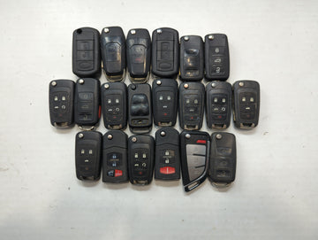 Lot of 24 Aftermarket Keyless Entry Remote Fob MIXED FCC IDS MIXED PART - Oemusedautoparts1.com