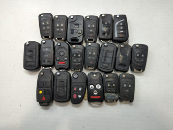 compare product Lot of 24 Aftermarket Keyless Entry Remote Fob MIXED FCC IDS MIXED PART