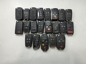 Lot of 23 Aftermarket Keyless Entry Remote Fob MIXED FCC IDS MIXED PART - Oemusedautoparts1.com