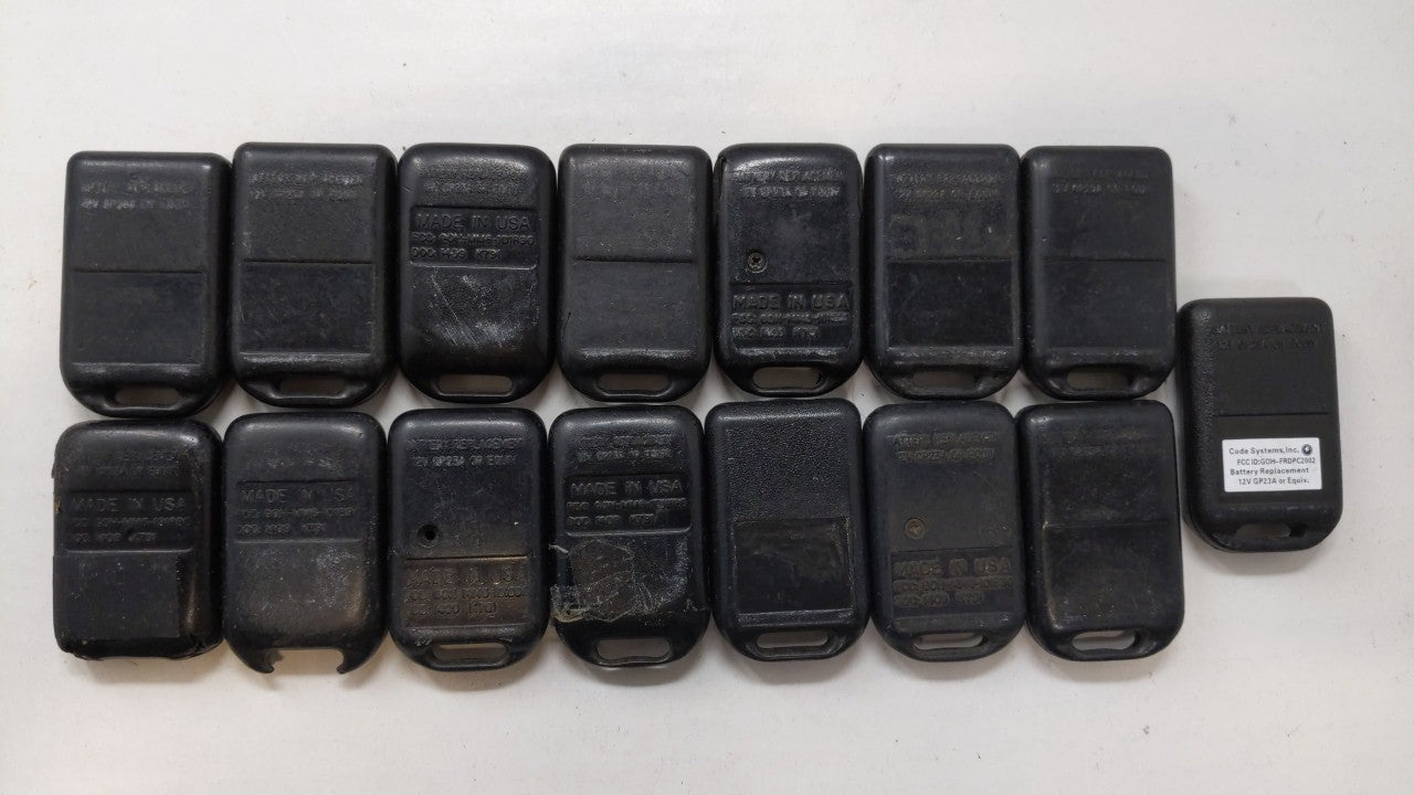 Lot of 15 Aftermarket Code Alarm Keyless Entry Remote Fob GOH-FRDPC2002 - Oemusedautoparts1.com