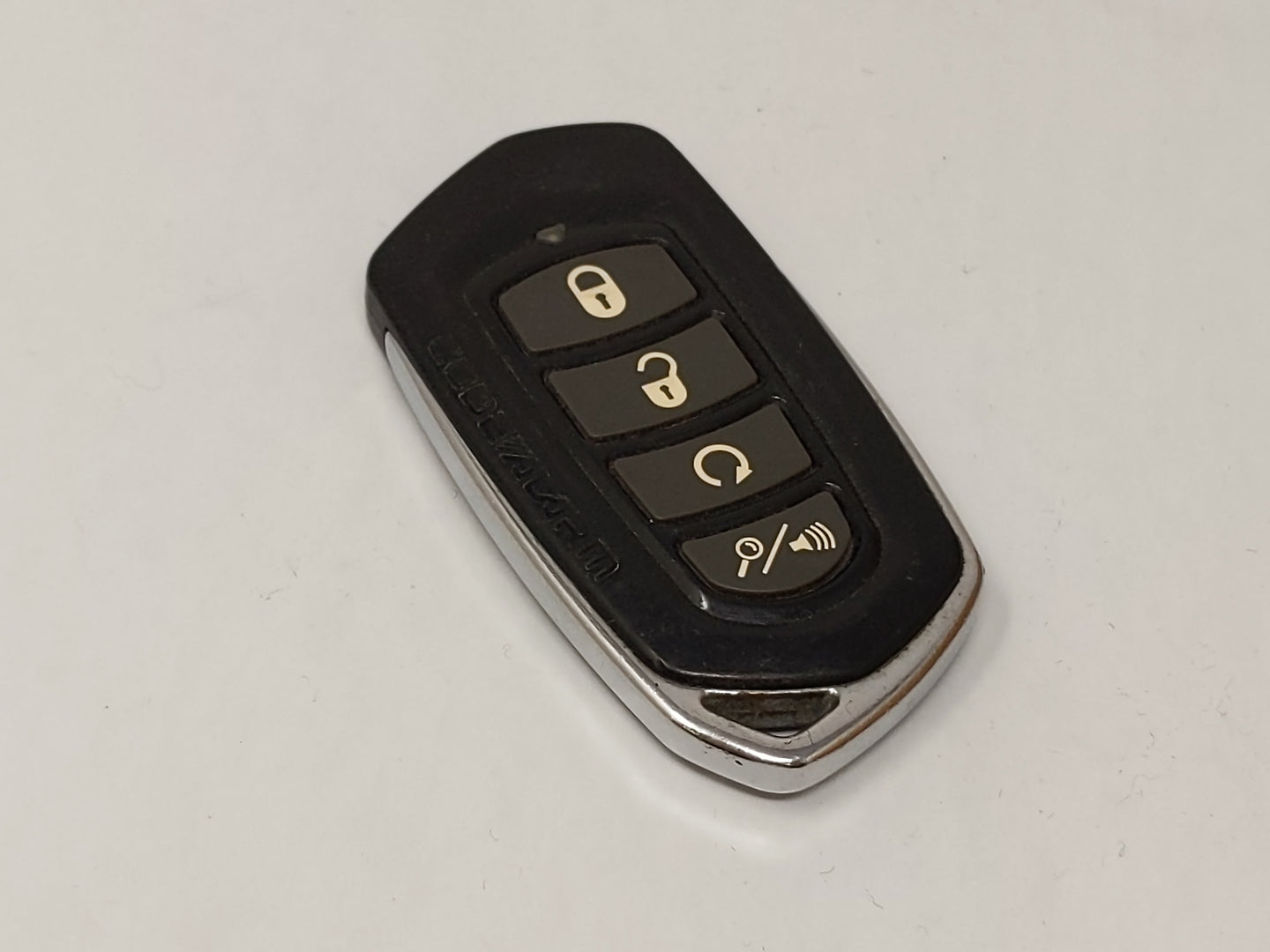 Code Alarm Keyless Entry Remote H5ot59 4 Buttons - Oemusedautoparts1.com