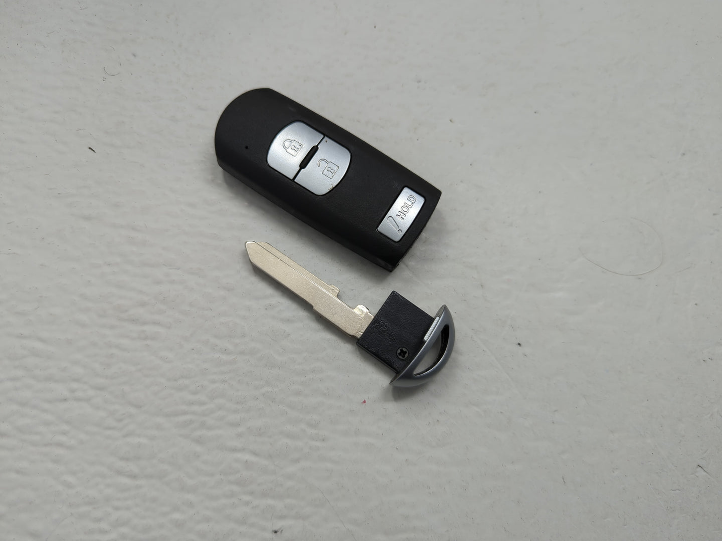Mazda Keyless Entry Remote Fob WAZSKE13D01 3 buttons - Oemusedautoparts1.com
