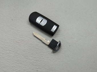 compare product Mazda Keyless Entry Remote Fob WAZSKE13D01 3 buttons