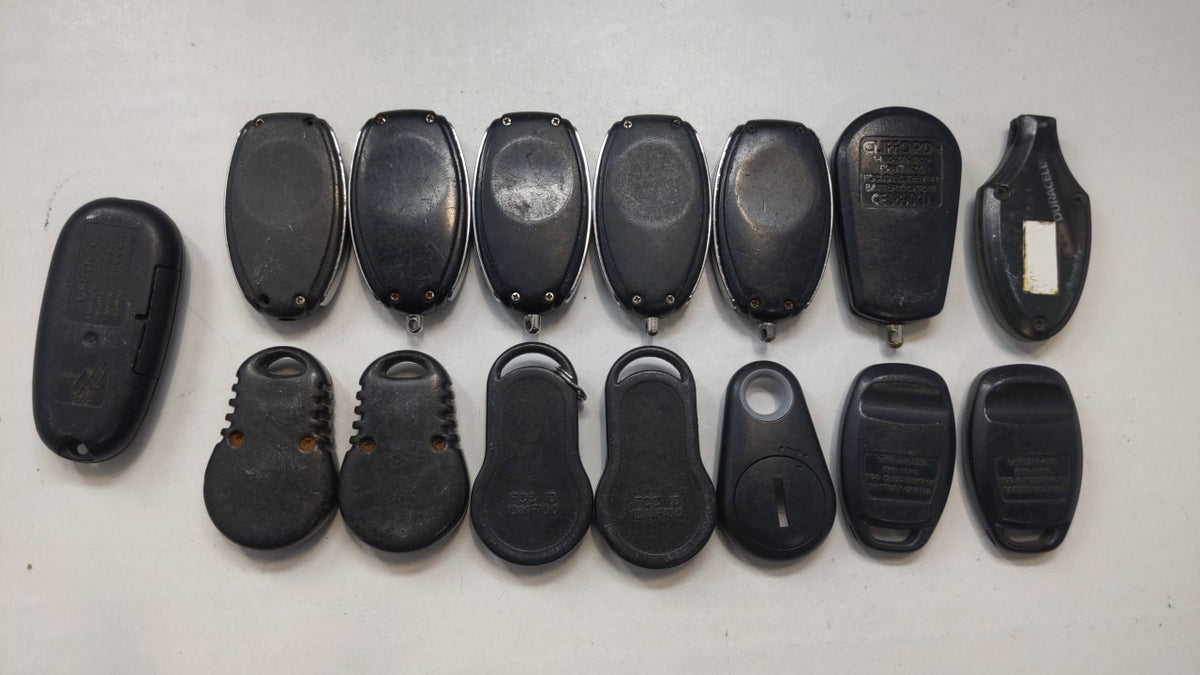 Lot of 15 Aftermarket Mixed Models Keyless Entry Remote Fob MIXED FCC IDS - Oemusedautoparts1.com