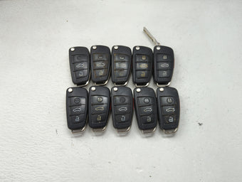 compare product Lot of 10 Audi Keyless Entry Remote Fob MIXED FCC IDS MIXED PART NUMBERS 1473951