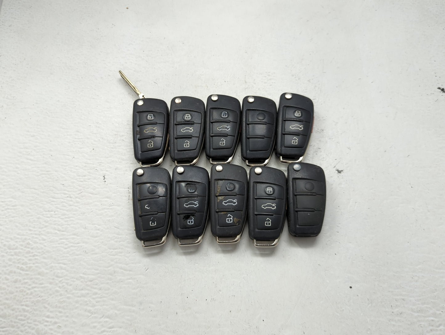 Lot of 10 Audi Keyless Entry Remote Fob MIXED FCC IDS MIXED PART NUMBERS 1473952 - Oemusedautoparts1.com