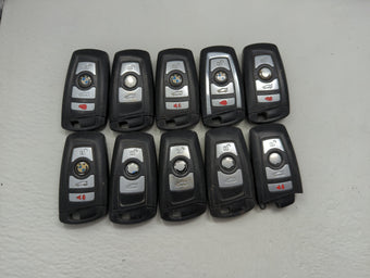 compare product Lot of 10 Bmw Keyless Entry Remote Fob MIXED FCC IDS MIXED PART NUMBERS