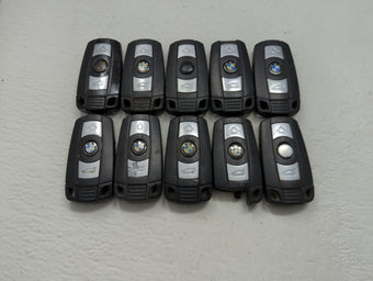 compare product Lot of 10 Bmw Keyless Entry Remote Fob MIXED FCC IDS MIXED PART NUMBERS