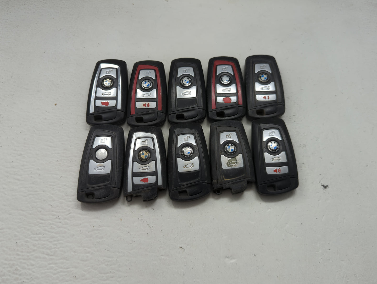 Lot of 10 Bmw Keyless Entry Remote Fob MIXED FCC IDS MIXED PART NUMBERS 1473962 - Oemusedautoparts1.com