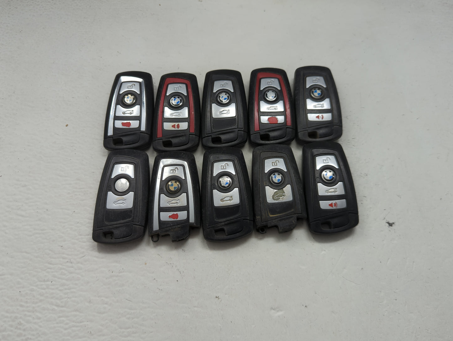 Lot of 10 Bmw Keyless Entry Remote Fob MIXED FCC IDS MIXED PART NUMBERS 1473962 - Oemusedautoparts1.com