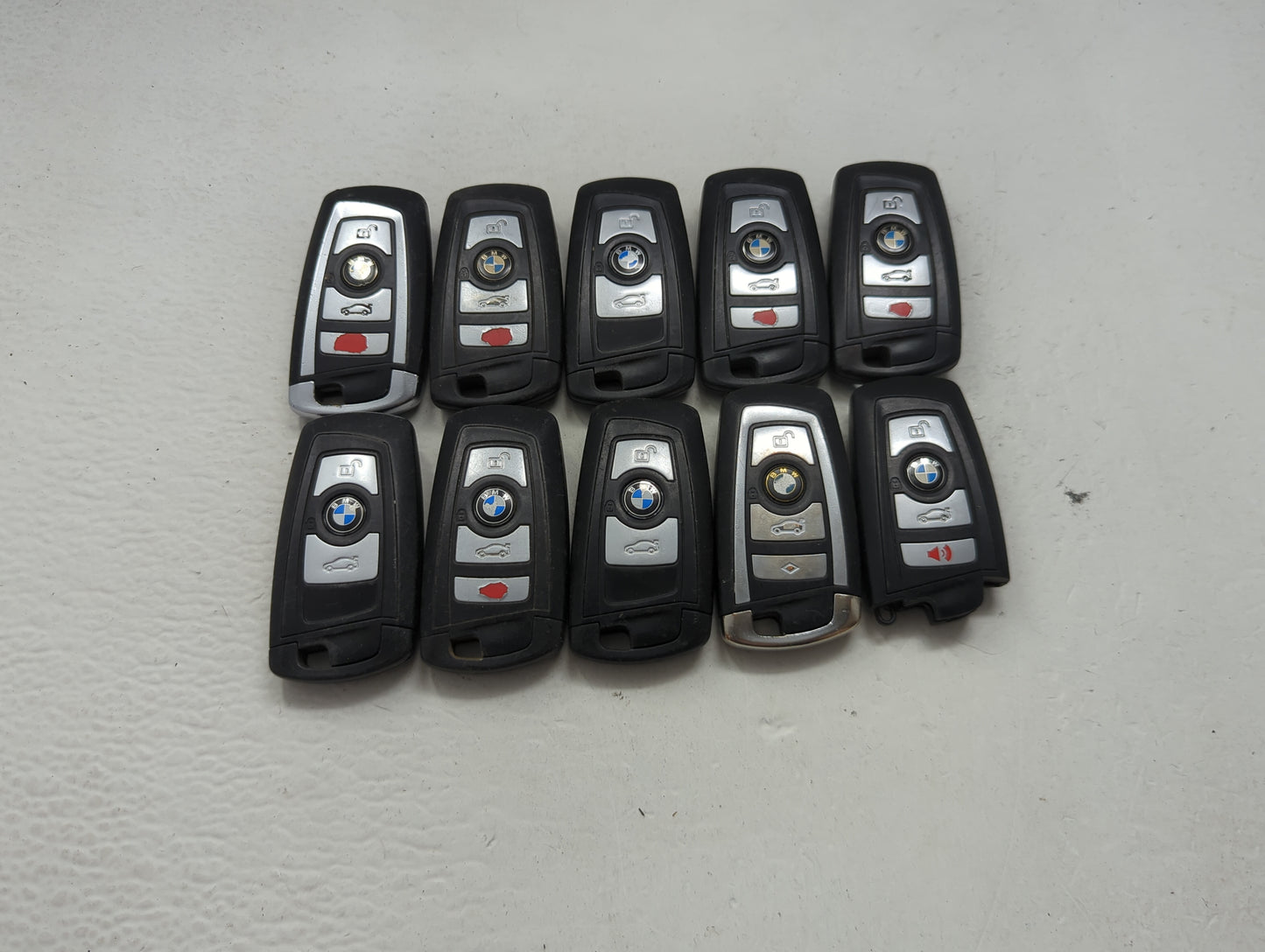 Lot of 10 Bmw Keyless Entry Remote Fob MIXED FCC IDS MIXED PART NUMBERS 1473983 - Oemusedautoparts1.com