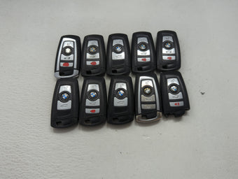 compare product Lot of 10 Bmw Keyless Entry Remote Fob MIXED FCC IDS MIXED PART NUMBERS 1473983