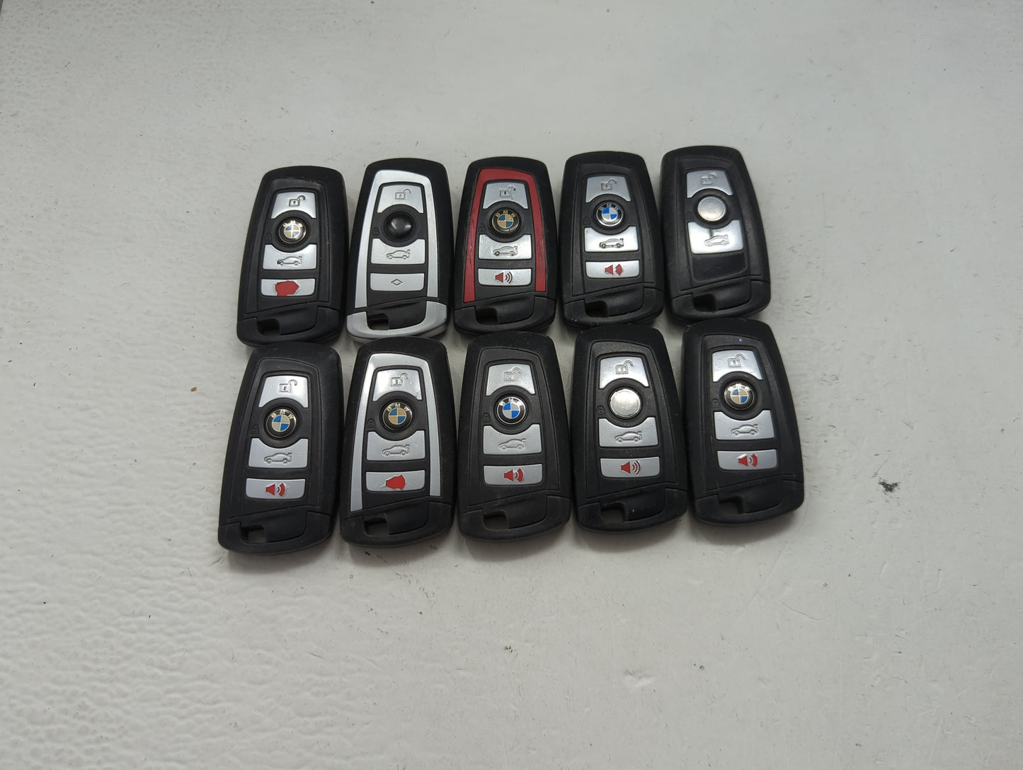Lot of 10 Bmw Keyless Entry Remote Fob MIXED FCC IDS MIXED PART NUMBERS 1473984 - Oemusedautoparts1.com