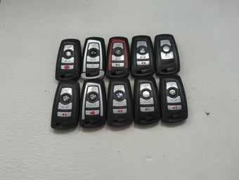 compare product Lot of 10 Bmw Keyless Entry Remote Fob MIXED FCC IDS MIXED PART NUMBERS 1473984