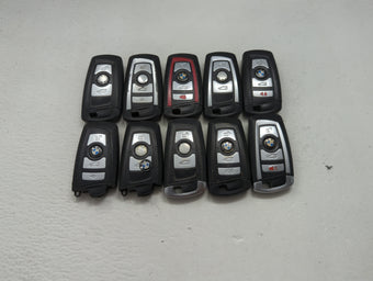 compare product Lot of 10 Bmw Keyless Entry Remote Fob MIXED FCC IDS MIXED PART NUMBERS 1473985