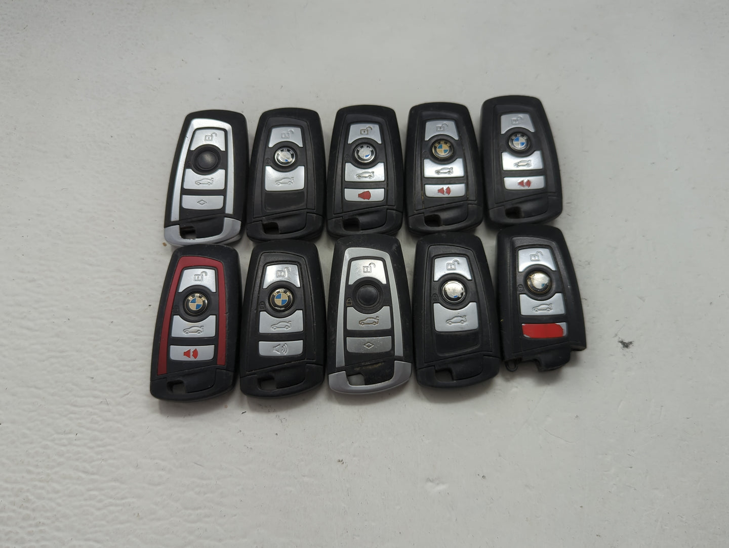 Lot of 10 Bmw Keyless Entry Remote Fob MIXED FCC IDS MIXED PART NUMBERS 1473986 - Oemusedautoparts1.com
