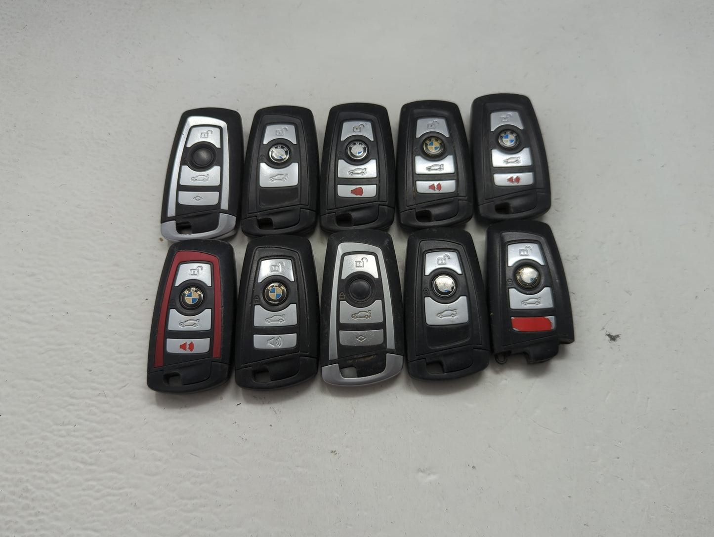 Lot of 10 Bmw Keyless Entry Remote Fob MIXED FCC IDS MIXED PART NUMBERS 1473986 - Oemusedautoparts1.com
