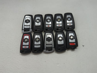 compare product Lot of 10 Bmw Keyless Entry Remote Fob MIXED FCC IDS MIXED PART NUMBERS 1473986