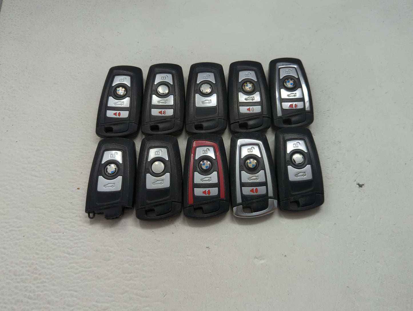 Lot of 10 Bmw Keyless Entry Remote Fob MIXED FCC IDS MIXED PART NUMBERS 1473987 - Oemusedautoparts1.com