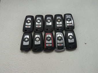 compare product Lot of 10 Bmw Keyless Entry Remote Fob MIXED FCC IDS MIXED PART NUMBERS 1473987