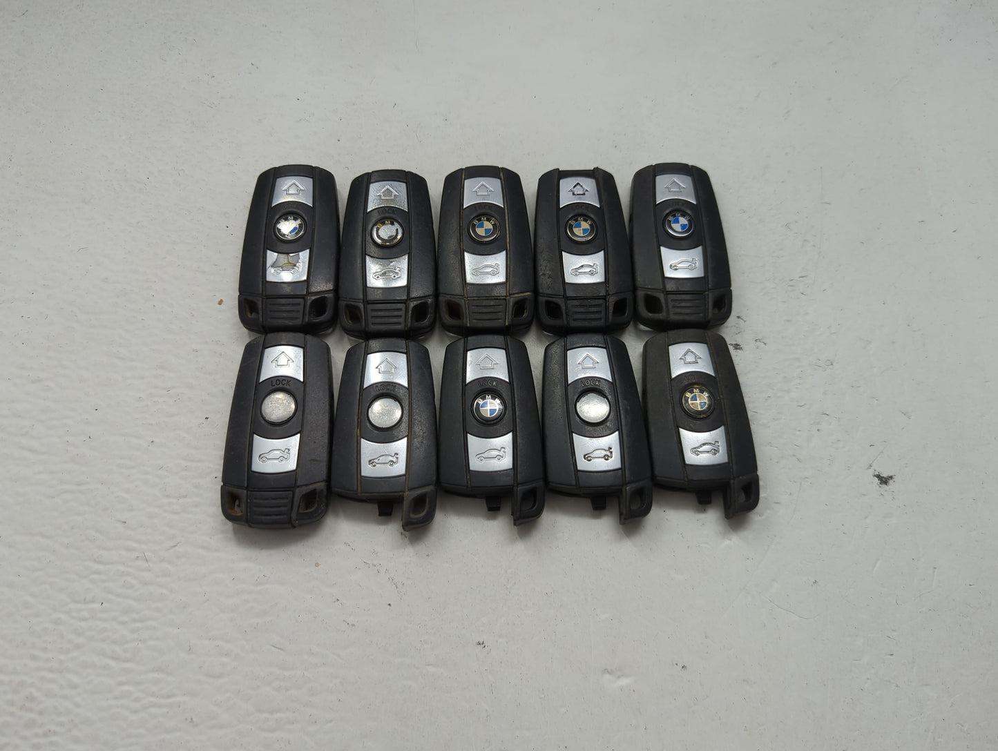 Lot of 10 Bmw Keyless Entry Remote Fob MIXED FCC IDS MIXED PART NUMBERS 1473989 - Oemusedautoparts1.com
