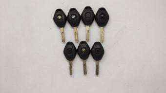 compare product Lot of 7 Bmw Keyless Entry Remote Fob MIXED FCC IDS MIXED PART NUMBERS
