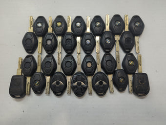 compare product Lot of 25 Bmw Keyless Entry Remote Fob MIXED FCC IDS MIXED PART NUMBERS