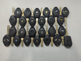 compare product Lot of 25 Bmw Keyless Entry Remote Fob MIXED FCC IDS MIXED PART NUMBERS